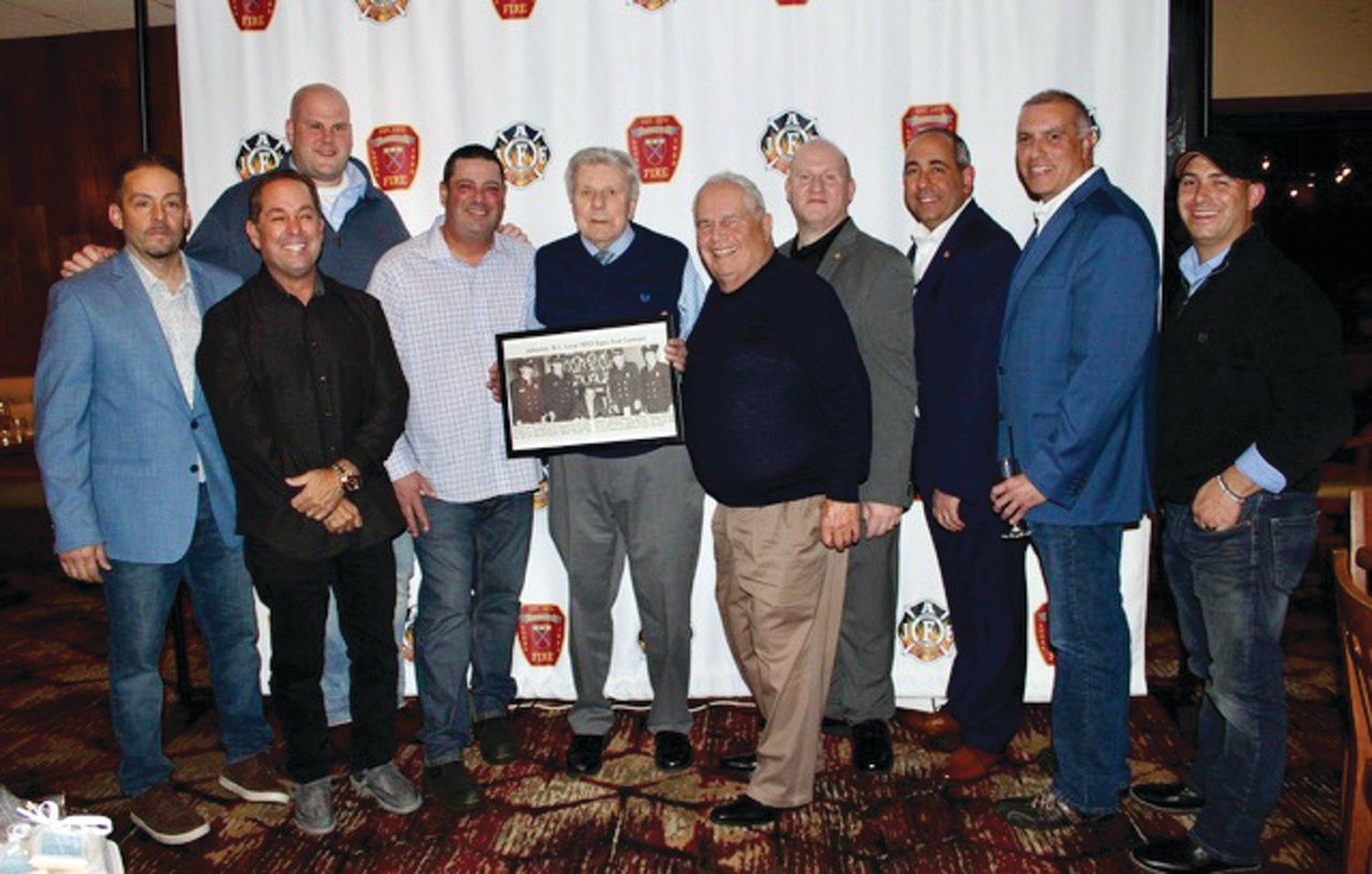 MILESTONE MEN: Local 1950’s current leadership joins former President Clayton Quick, Charter Member Alfred Masciarelli and former President Joseph Andriole during a special presentation at the recent 50th Anniversary Party. From left are: John Jasparro, David Pingitore, Don Roberts, Jon Pistacchio, Clayton Quick, Al Masciarelli, Keith Calci, Joe Andriole, Sal Martira and Chris DelFino.